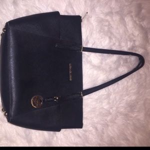 Black Michael Kors purse.
